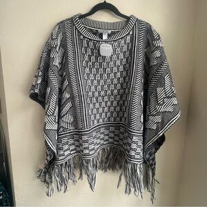 New with tags Black and white sweater poncho with fringe bottom